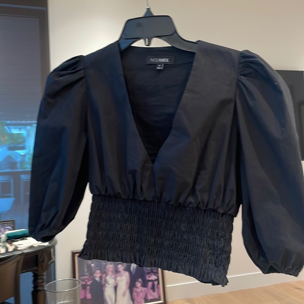 Intermix cropped puff sleeve top.